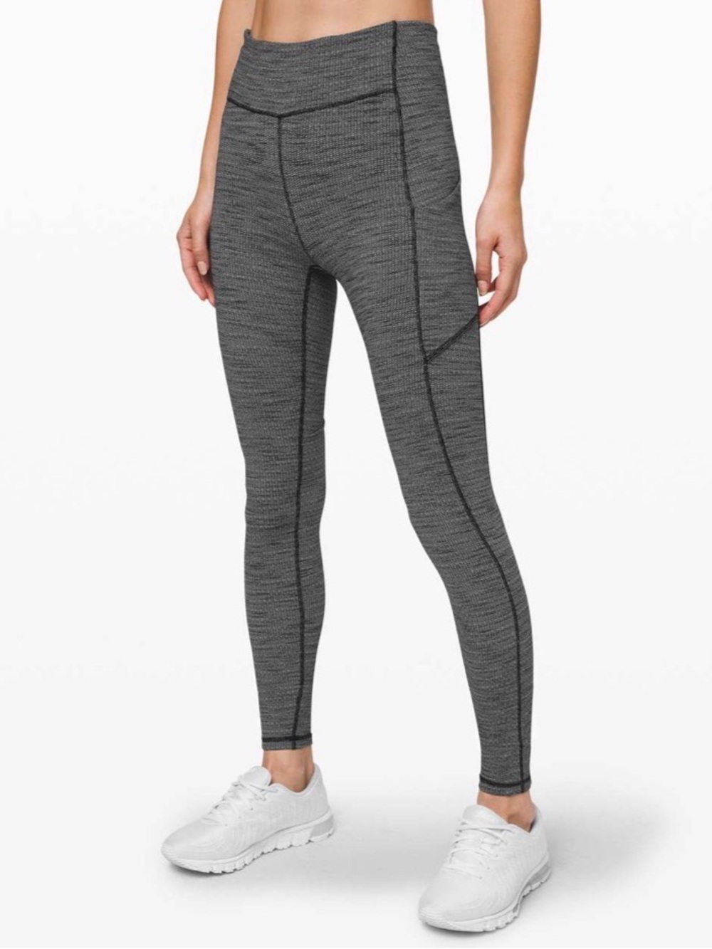 Lululemon Speed Up Tight in a variegated black heathered knit pattern. So 🔥🧡